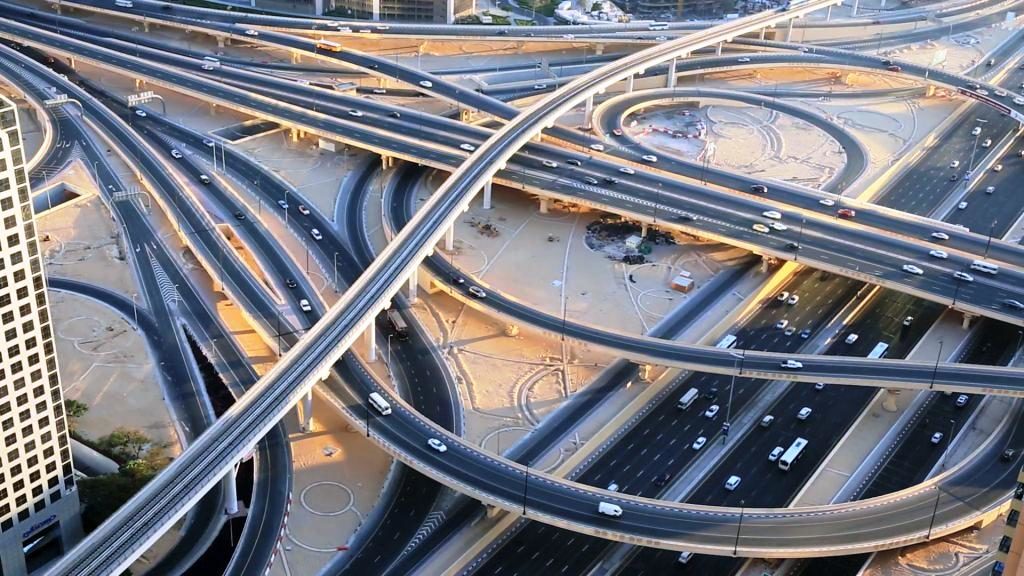 dubai-march-2015-uae-sheikh-zayed-road-intersection-metro-rail-city-vehicle-building-business-construction-transport-traffic-travel-tourism_halmq82yn__F0000-1024x576.jpg